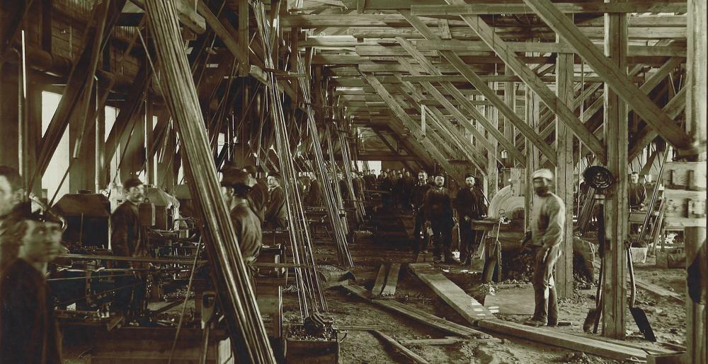 Employees in an old factory of Mustad